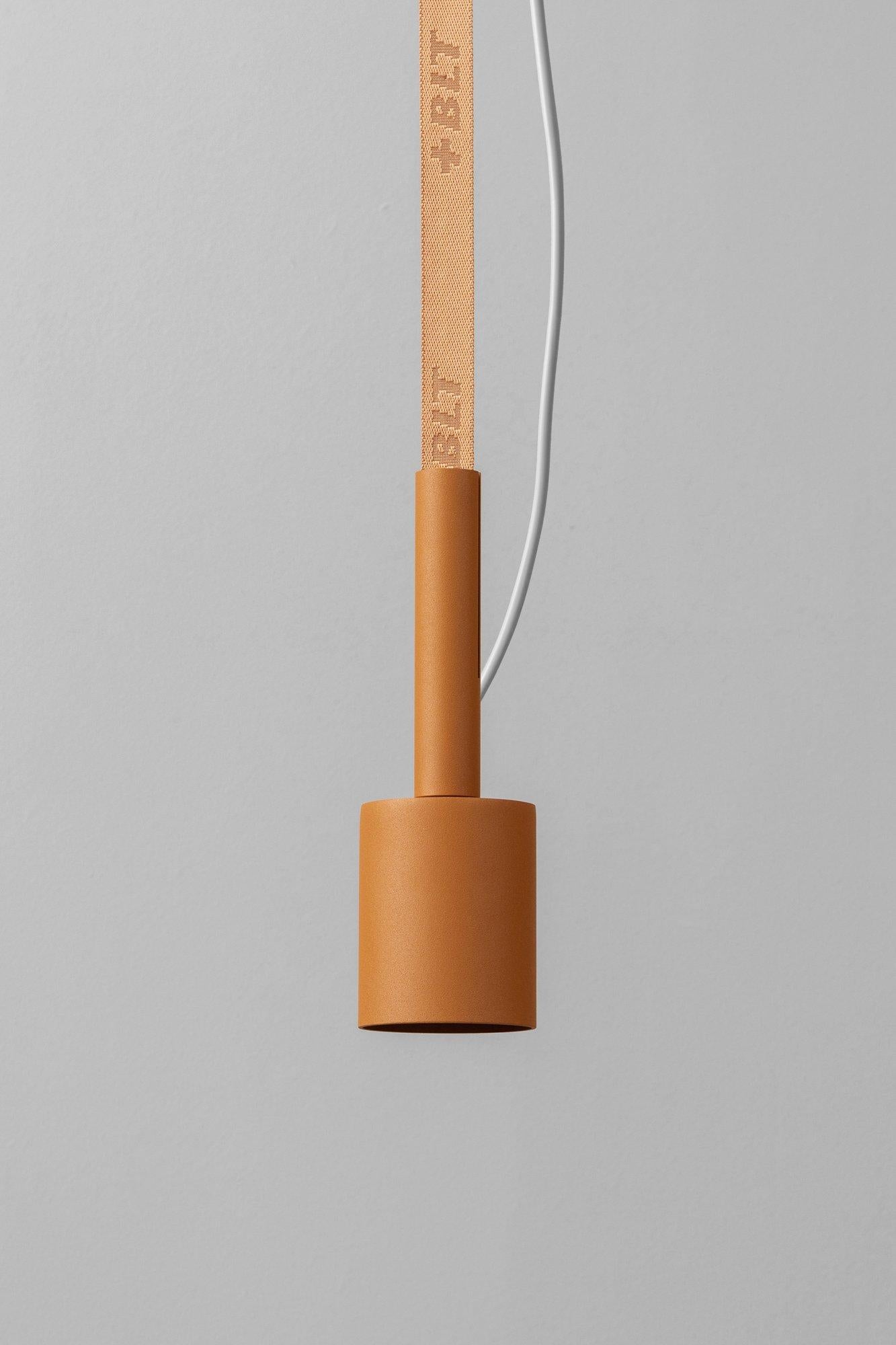 BLT_5 Almond Pendant Lamp by +kouple
Dimensions: Ø 8 x H 25,2 cm. 
Materials: Powder-coated steel and textile.

Available in different color options. The rod length is 250 cm. Please contact us.

All our lamps can be wired according to each country.