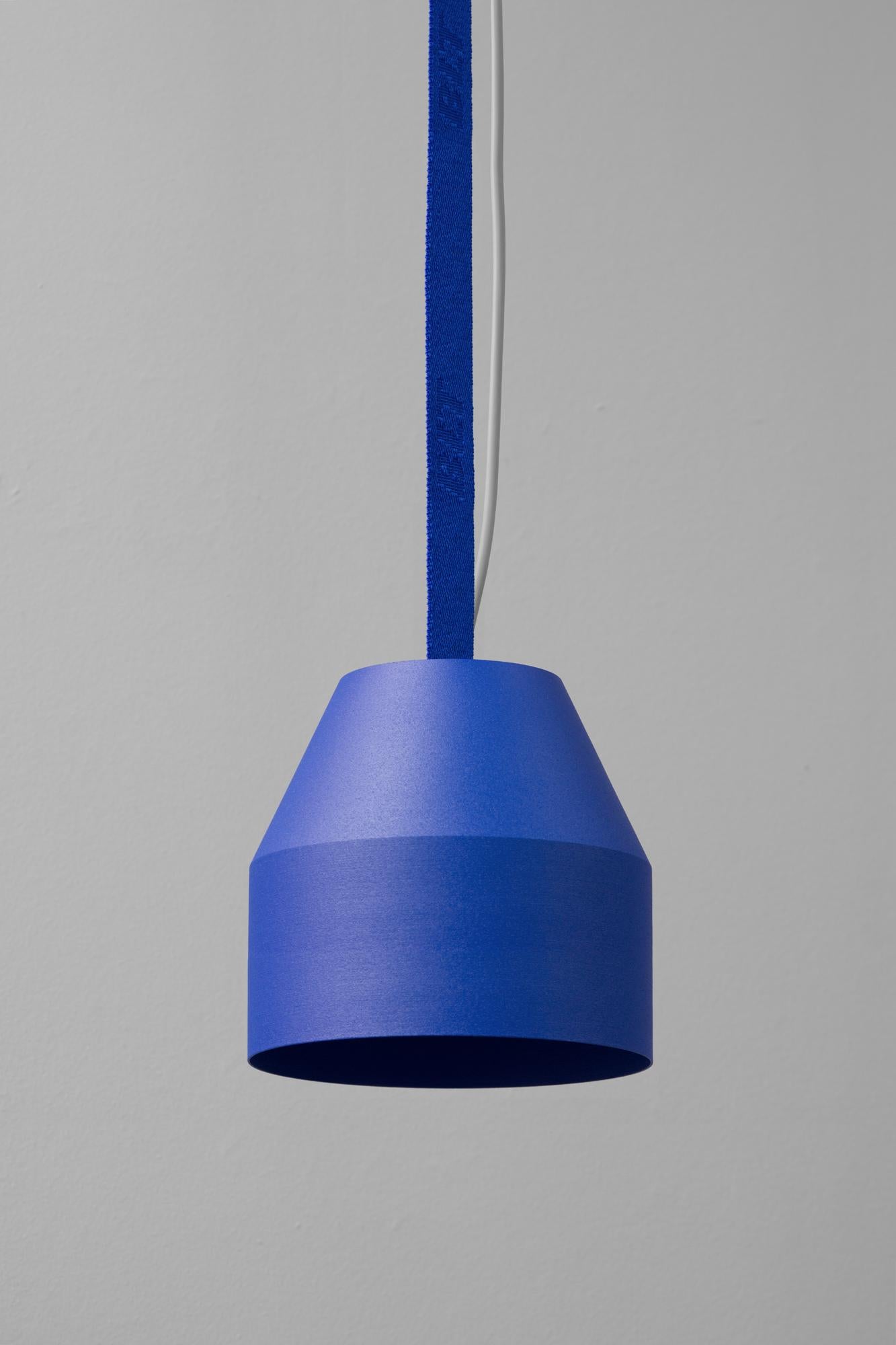 BLT_CAP Big Ultra Blue Pendant Lamp by +kouple
Dimensions: Ø 16 x H 16,5 cm. 
Materials: Powder-coated steel and textile.

Available in different color options. The rod length is 250 cm. Please contact us.

All our lamps can be wired according to