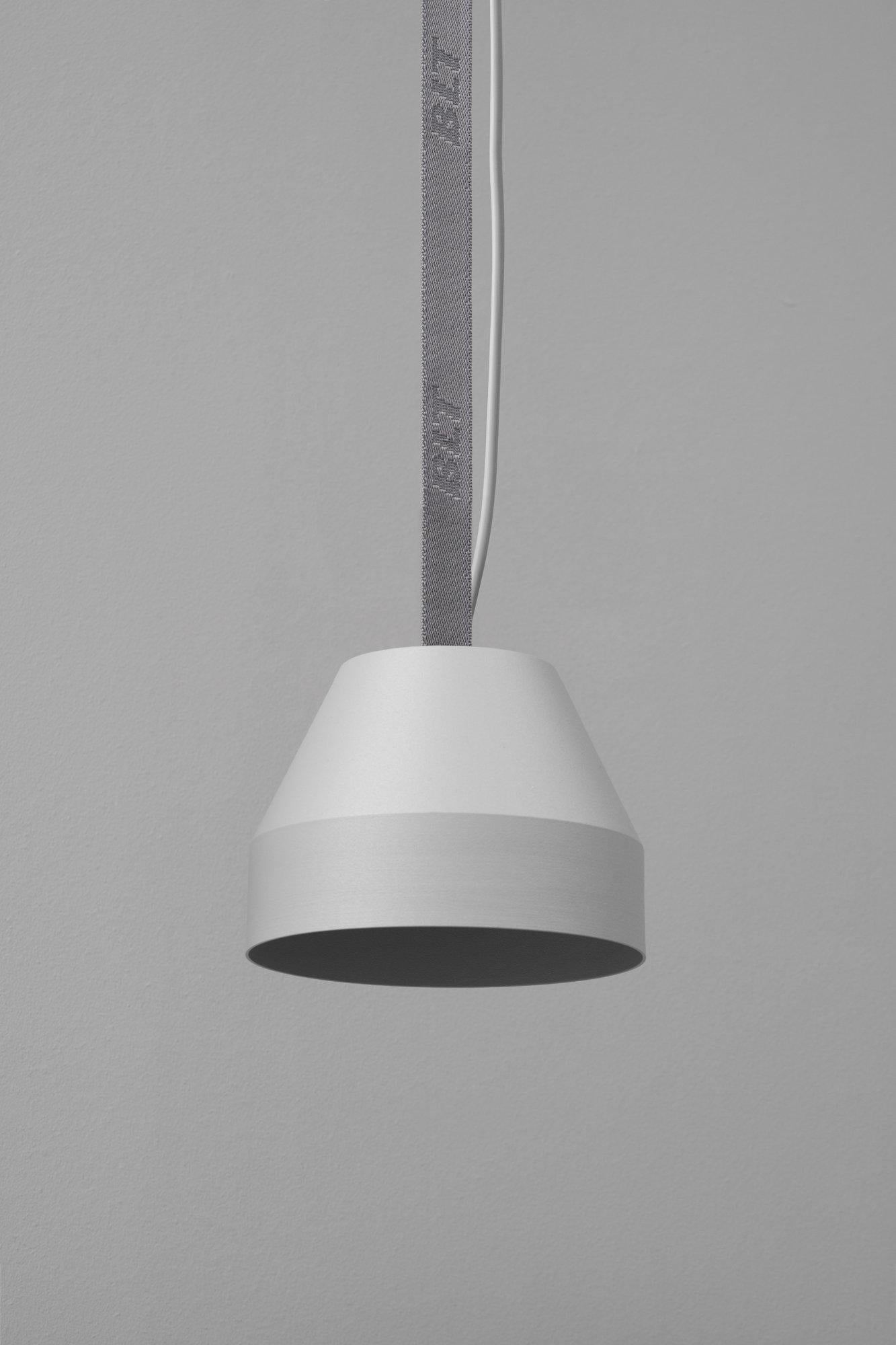 BLT_CAP Small Grey Pendant Lamp by +kouple
Dimensions: Ø 16 x H 12 cm. 
Materials: Powder-coated steel and textile.

Available in different color options. The rod length is 250 cm. Please contact us.

All our lamps can be wired according to each