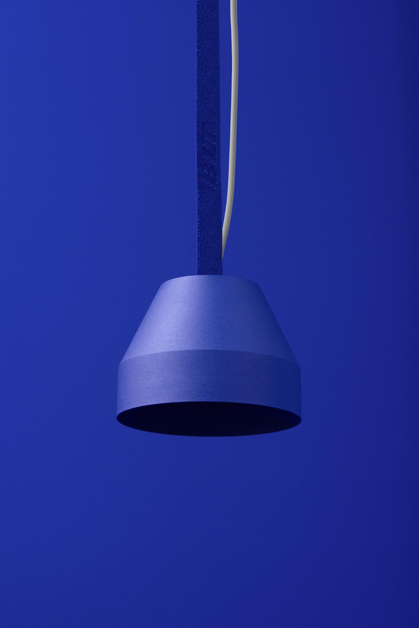 BLT_CAP Small Ultra Blue Pendant Lamp by +kouple
Dimensions: Ø 16 x H 12 cm. 
Materials: Powder-coated steel and textile.

Available in different color options. The rod length is 250 cm. Please contact us.

All our lamps can be wired according to