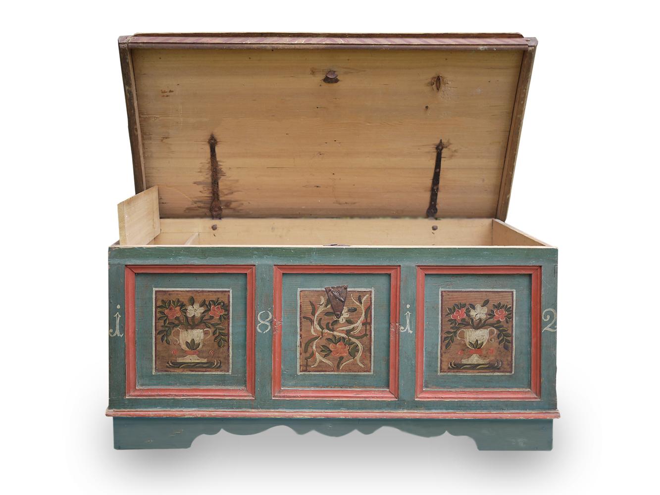 Northern Italian (Alpine) painted chest

Measures:
H 66cm, W 136cm, D 68cm
H 26 in, W 53.5 in, D 26.8 in.

Antique painted alpine chest, dated 1812, not yet restored.
On the front there are three framed panels, enriched with flower cups. The