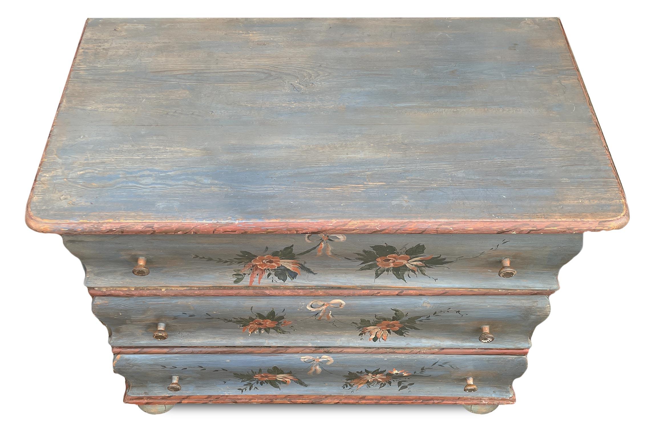 Painted Tyrolean chest of drawers

Period: approximately 1850
Origin: Tyrol
Essence: Fir

Measurements:
Height: 77cm
Width: 106cm
Depth: 58 cm

Tyrolean painted chest of drawers, with three tie rods. The face of each tie rod is shaped and slightly