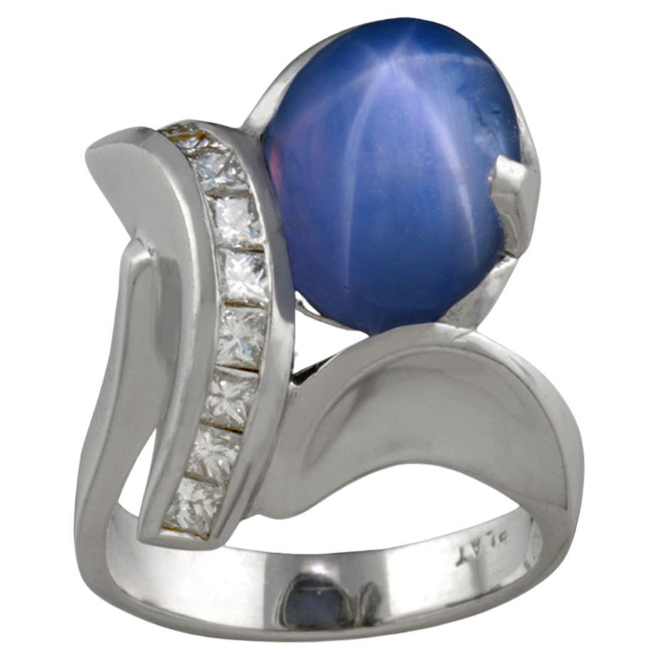Blue 15.62 Carat Star Sapphire Cabochon Platinum Ring with .90 Carats of Diamond For Sale