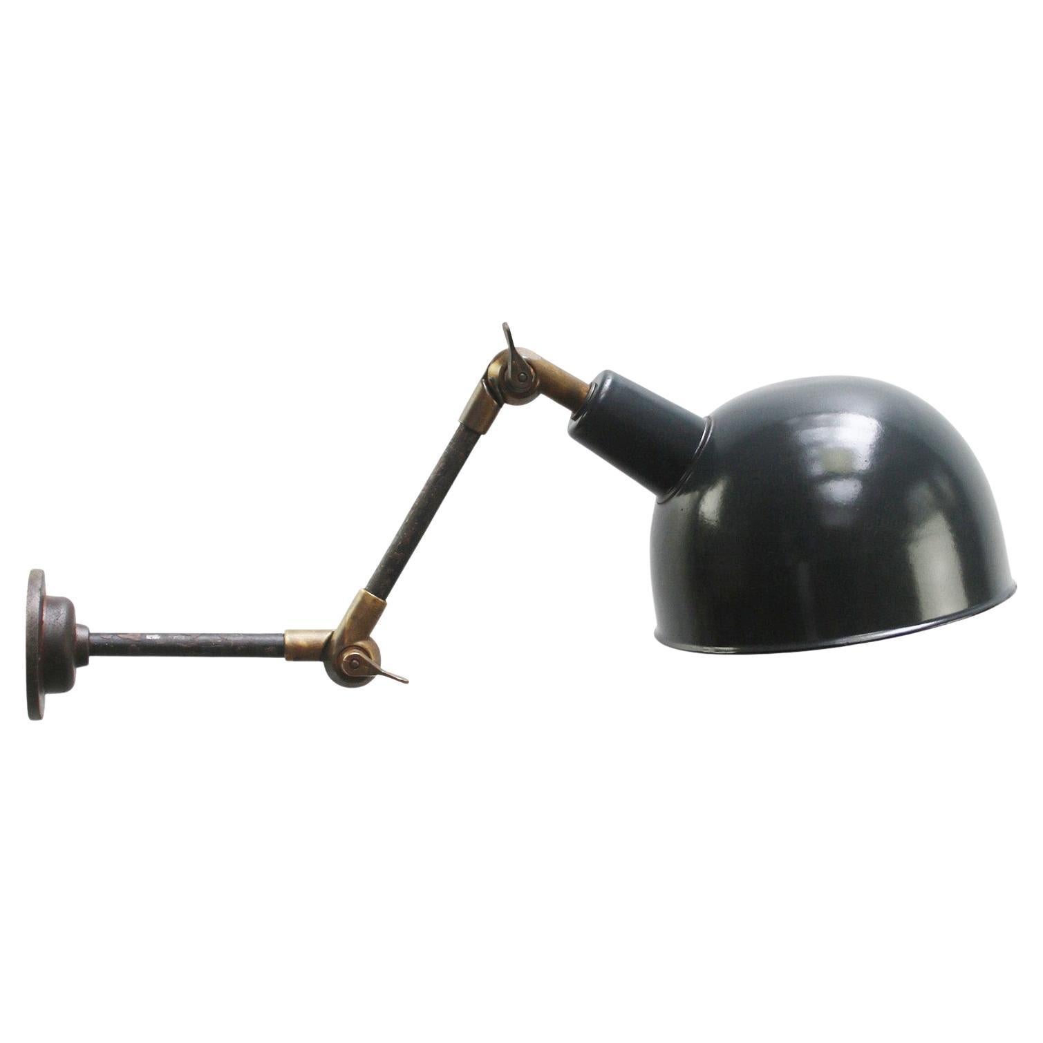 1950s Blue enamel, cast iron industrial 2 arm machinist work light
adjustable in height
width as pictures: 70 cm

Diameter Wall plate 10,5 cm / 4 inches

Priced per individual item. All lamps have been made suitable by international standards for