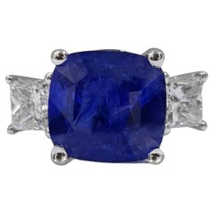 Bague en or 18 carats avec saphir bleu de 4,65 carats et diamants latéraux