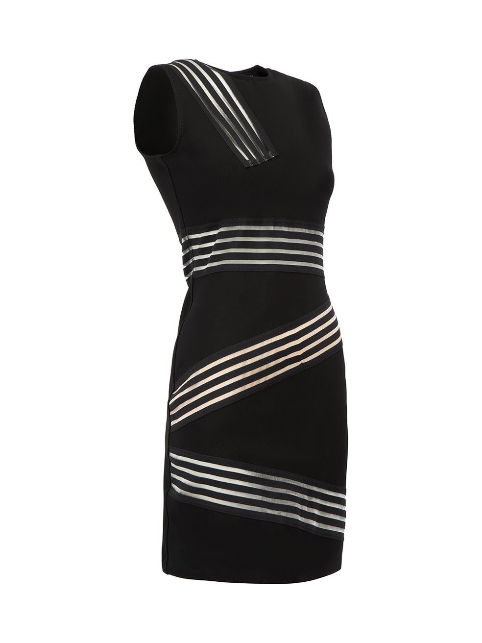 CONDITION is Very good. Minimal wear to dress is evident. Minimal wear to the elastic trim with pulls to the threading on this used Christopher Kane designer resale item.



Details


Black

Viscose

Body-con mini dress

Sleeveless

Round