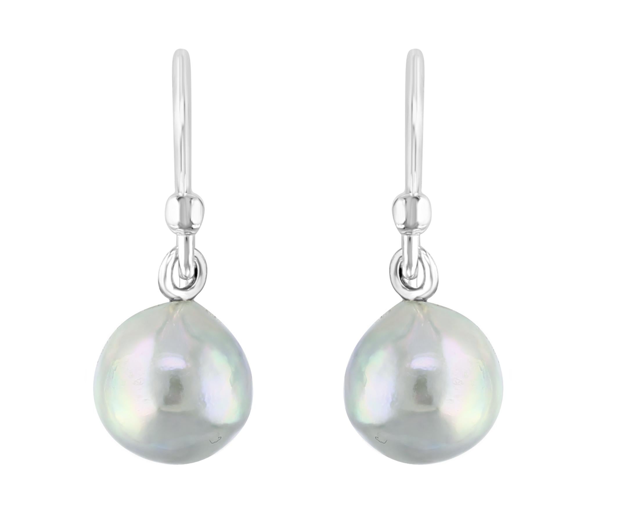These beautiful dangling earrings feature  Akoya natural-color blue baroque pearls that measure 7.-5-8mm. The pearls hang from sterling silver ear wires.  Simple, yet elegant, this style is a must for any collection.

AN ELEGANT EXPRESSION – This