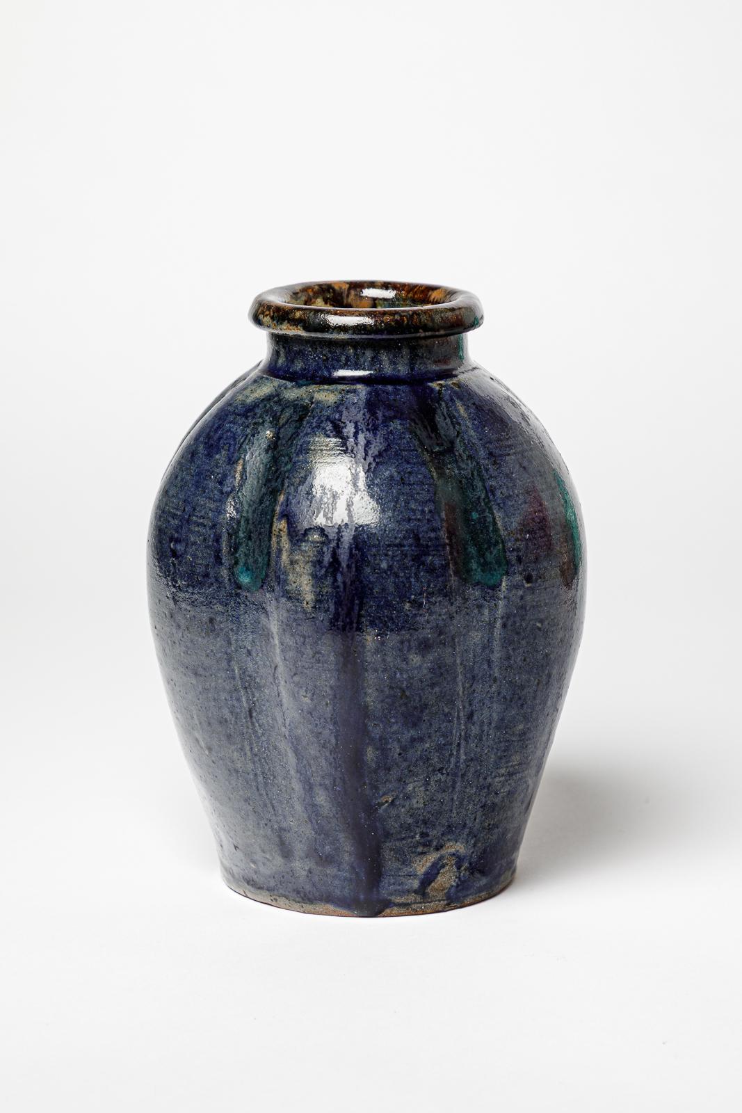 Marius Bernon

Art deco 20th century stoneware ceramic vase

Realised in La Borne

Circa 1940

Signed

Blue and black stoneware ceramic glazes colors

Height 21 cm
Large 16 cm