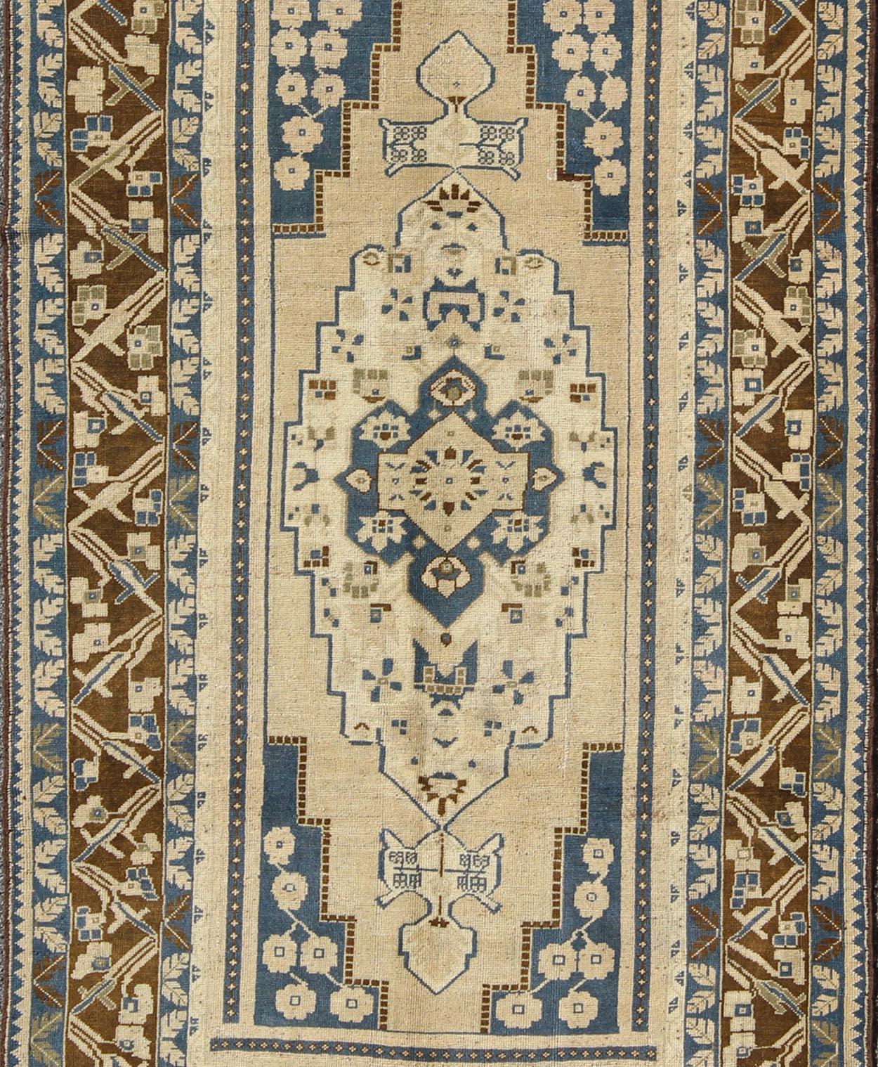 Hand-Knotted Blue and Brown Oushak Vintage Rug from Turkey with Geometric Layered Medallion For Sale