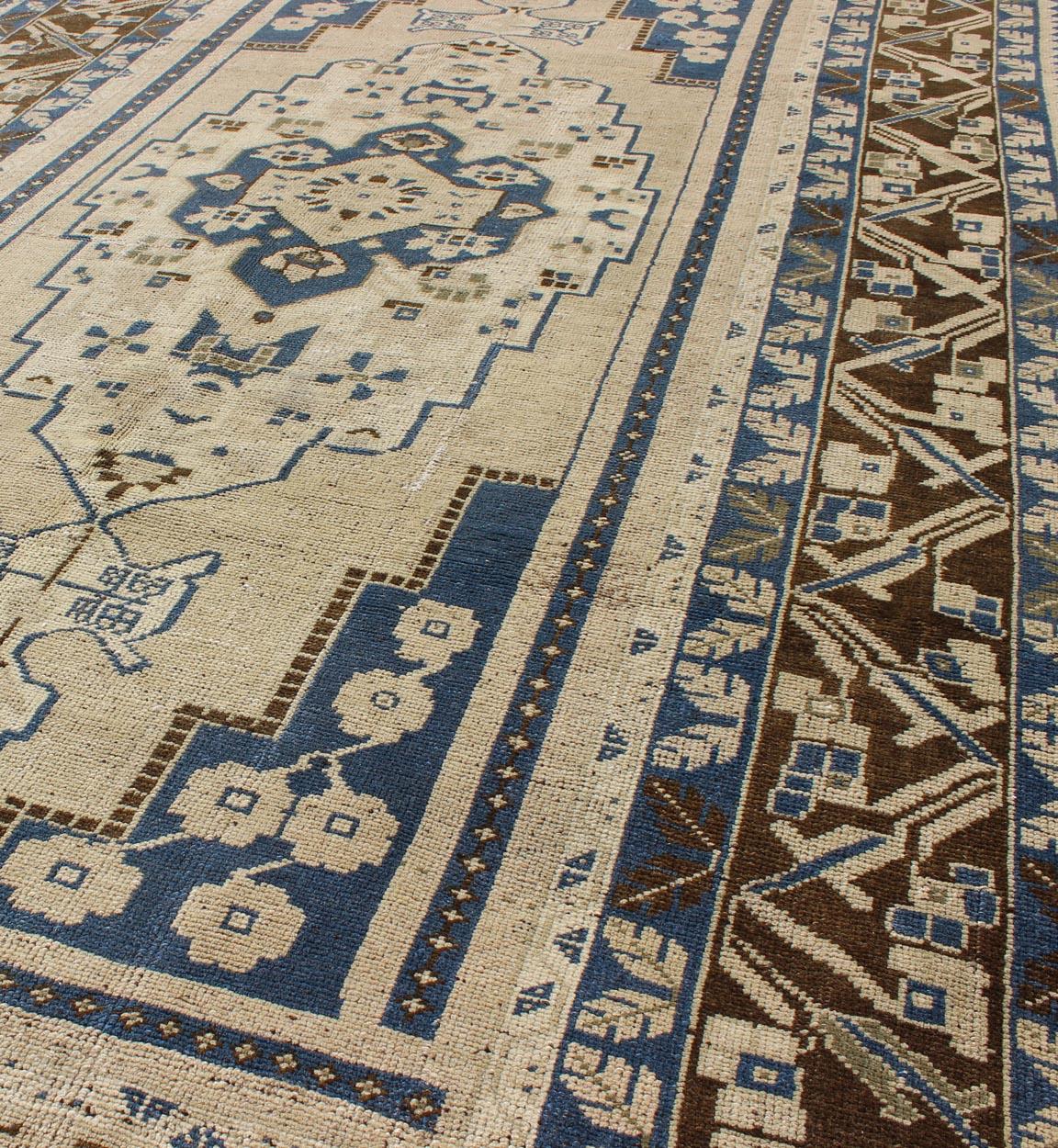Wool Blue and Brown Oushak Vintage Rug from Turkey with Geometric Layered Medallion For Sale