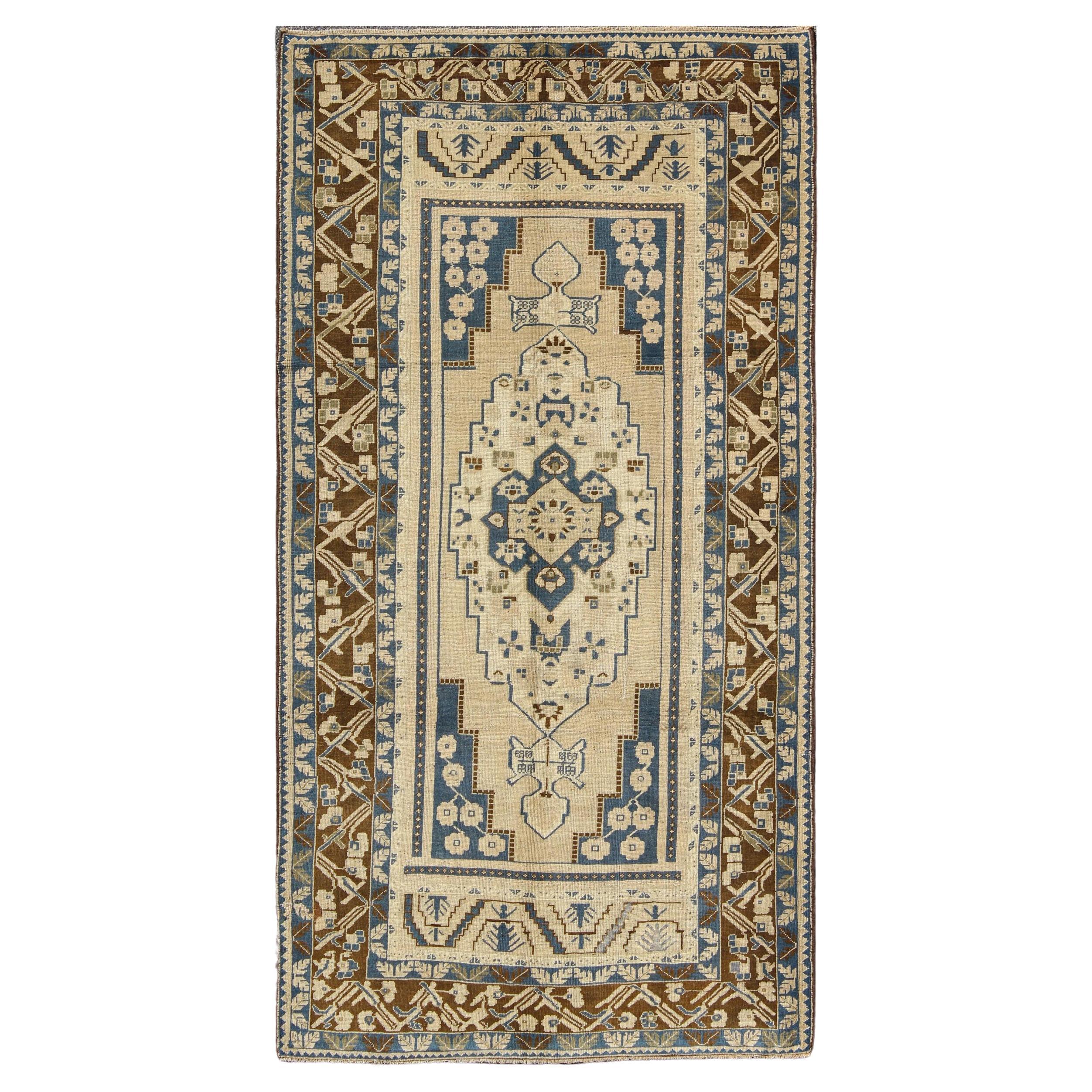 Blue and Brown Oushak Vintage Rug from Turkey with Geometric Layered Medallion For Sale