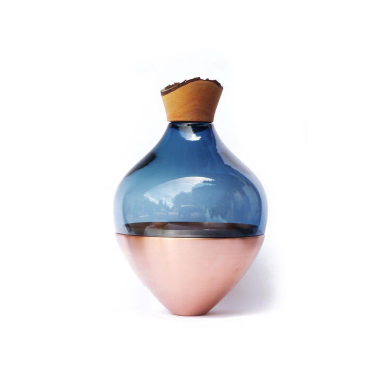 Blue and copper sculpted blown glass, Pia Wüstenberg
Dimensions: Height 20 x diameter 38cm
Materials: Hand blown glass, Copper

Pia Wüstenberg, Utopia
Pia Wüstenberg is a creative with a passion for materials and craft. She graduated from the Royal