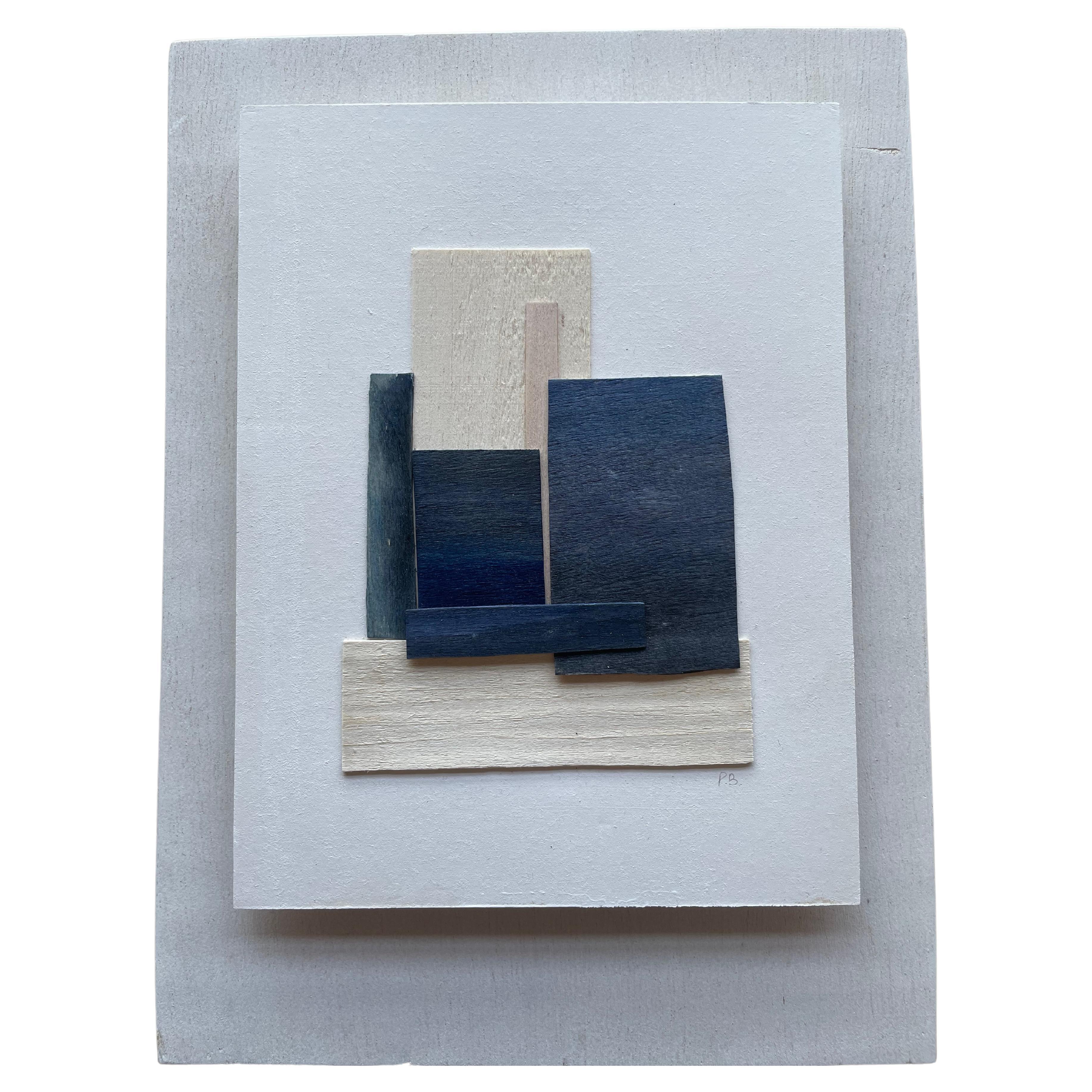 Contemporary French artist Perrine Blaise paints on thin slices of wood.
Weathered effect.
Shades of blue and cream.
Abstract shapes.
Framed in white wood.
Part of a large collection.
Signed by the artist.