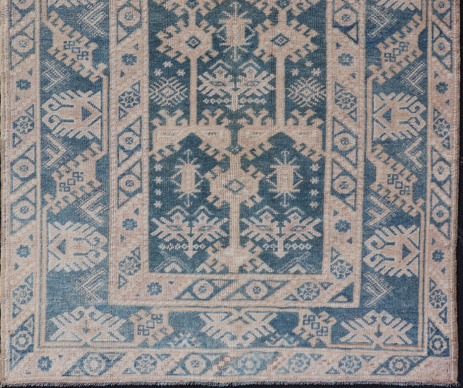 20th Century Blue and Cream Turkish Oushak Rug Vintage with All-Over Motif Design For Sale