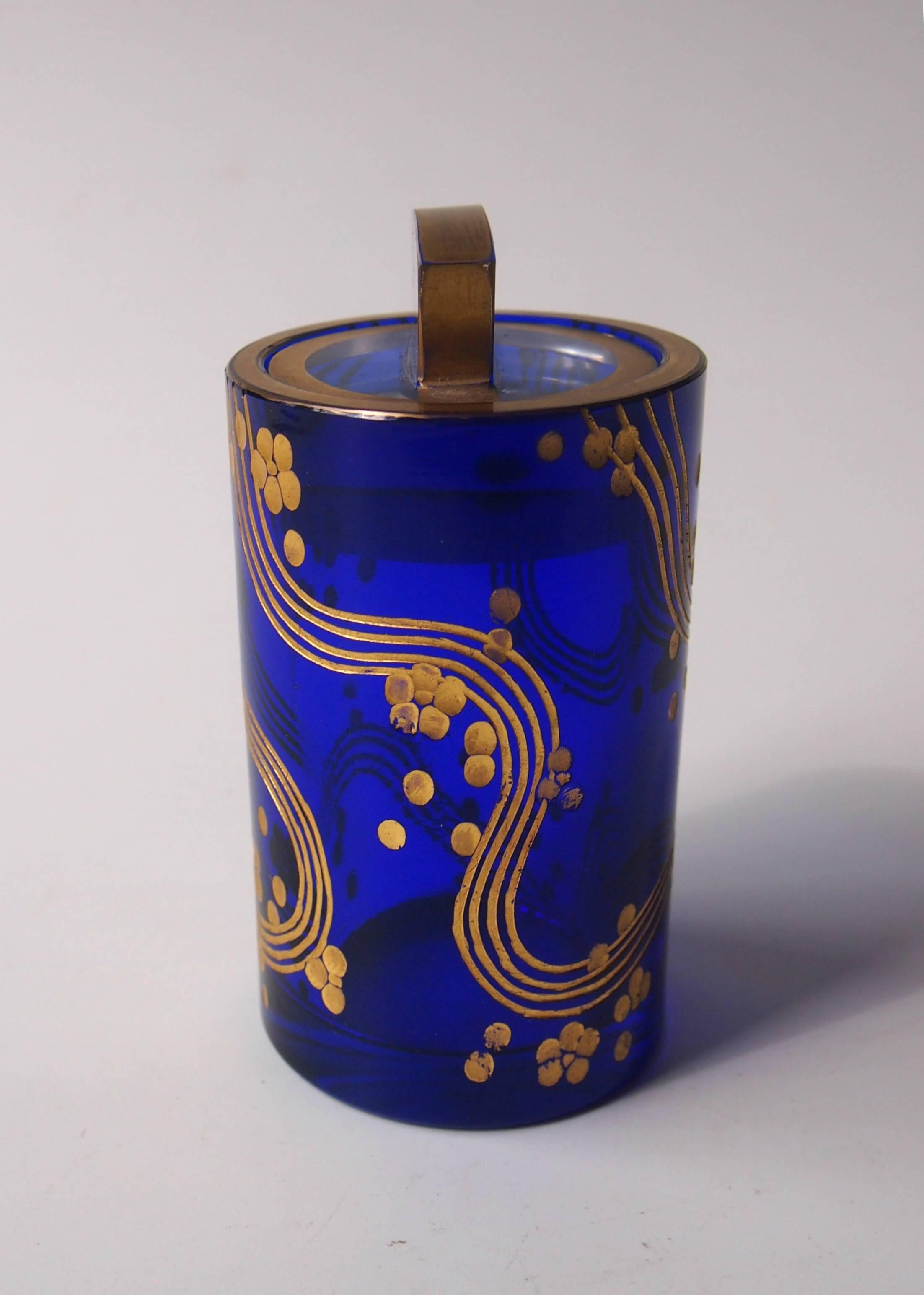 Exceptionally stylish cobalt blue and gilded small pot and cover by Ortel of Haida in the Wiener Werkstätte style -Ortel made a lot of pieces for the Wiener Werkstätte -we are not sure if this is for them or just in that style. Both the base of the