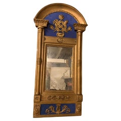 Blue and gold lacquered wooden mirror, with medicine symbol, Italy