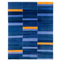 Alfombra tribal moderna de lana natural azul y dorada Empyrean by Joseph Carini