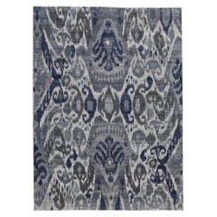 Blauer und grauer Ikat-Wollteppich 5'1''x7'