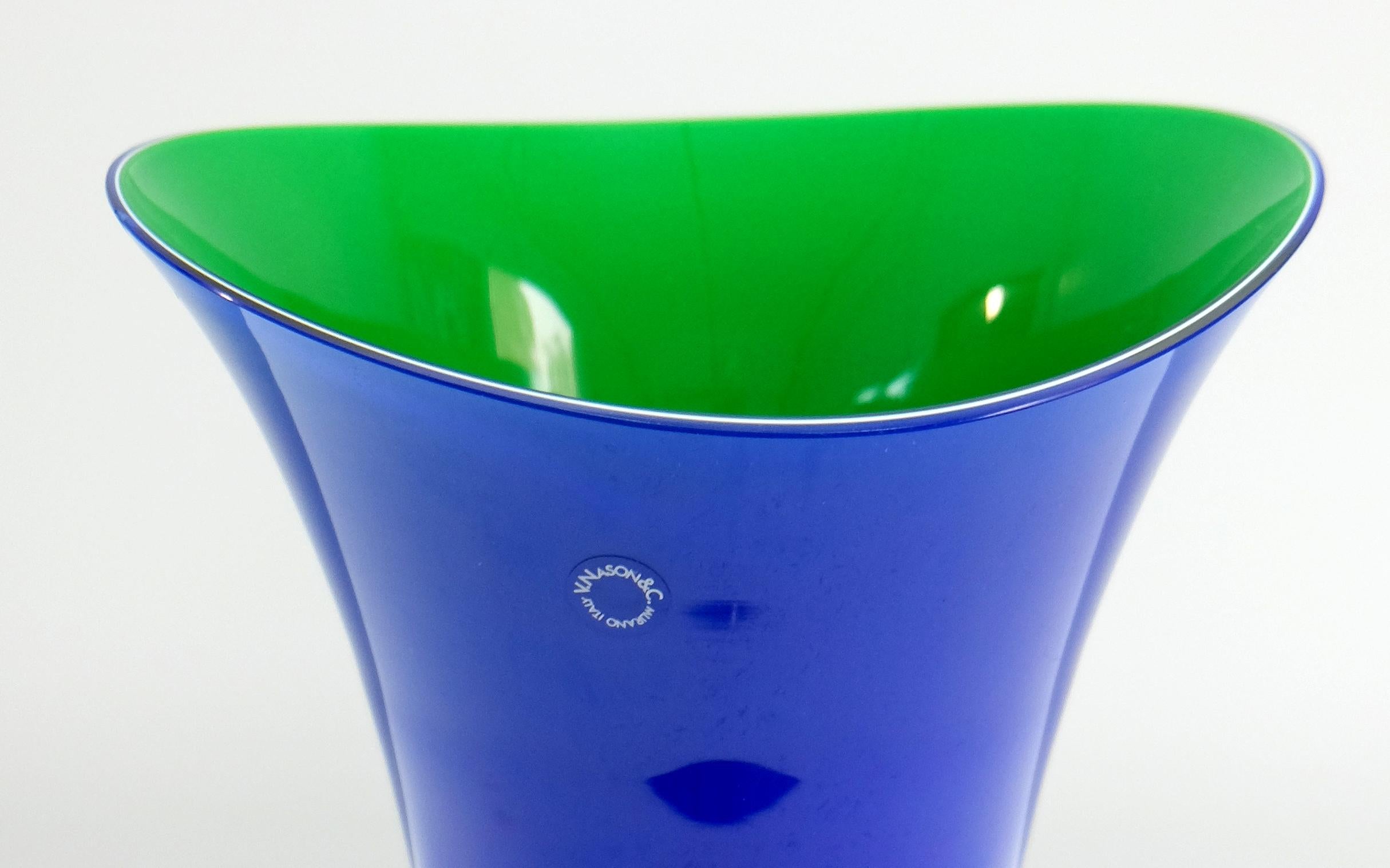  
Murano Glass Vase Set by V. Nason & C. Italy, Blue and Green Asymmetric Vases

Offered for sale is a striking pair of hand-blown asymmetrical vases in blue and green by V. Nason & C. The vases retain the original maker's label.
Vincenzo Nason