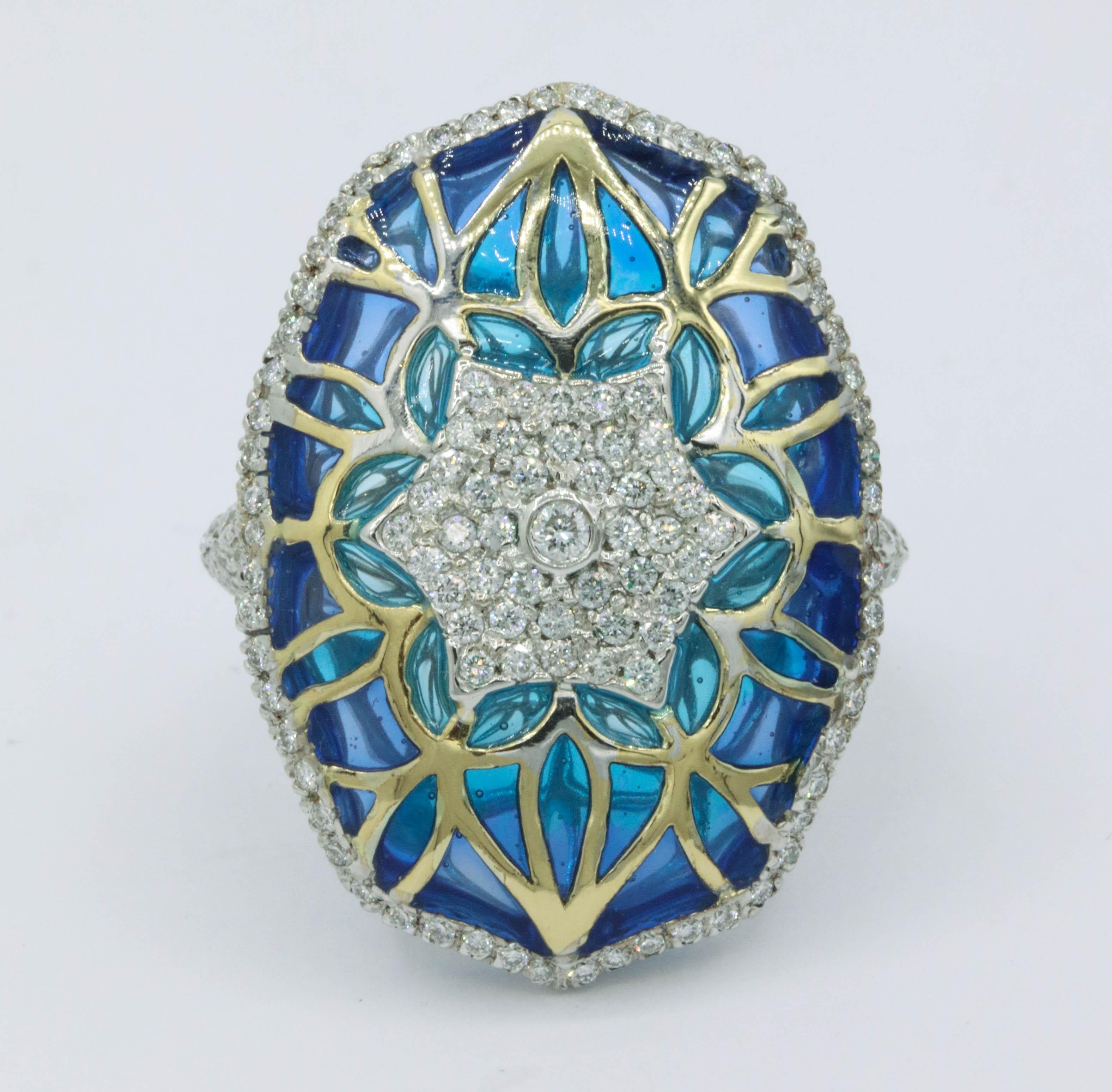 Blue and Green Enamel floral ring featuring 141 round brilliants weighing 1.24 Carats, in two tone 18 Karat White and Yellow Gold. 
Color H-I 
Clarity SI 