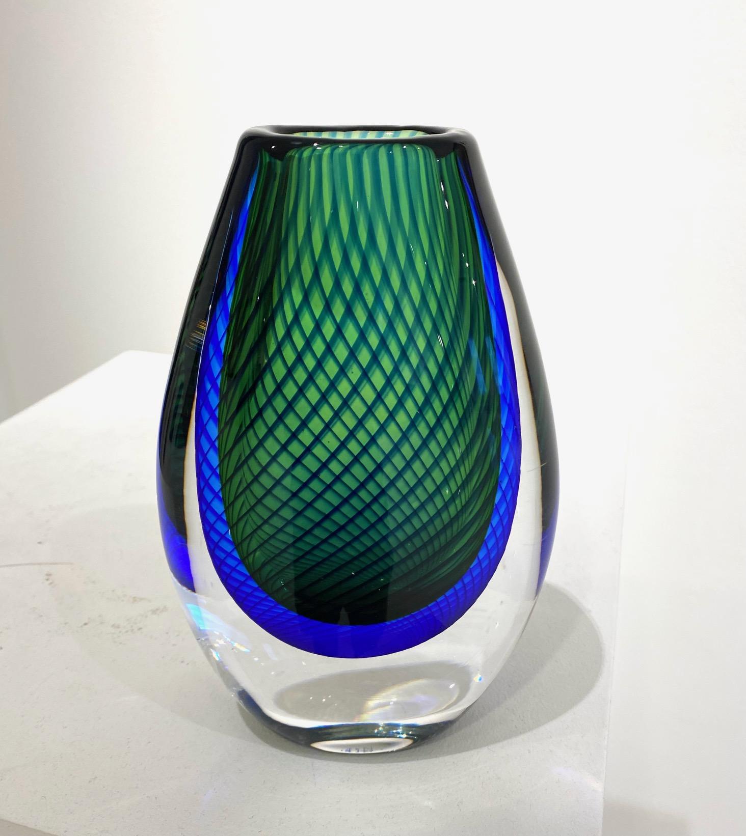 blue and green glass vase by Vicke Lindstrand for Kosta Boda Etched signature and number to underside of each example ‘Kosta 41592 V. Lindstrand’. Sweden: circa 1959 Lindstrand, who had begun his career as an illustrator before moving into glass,