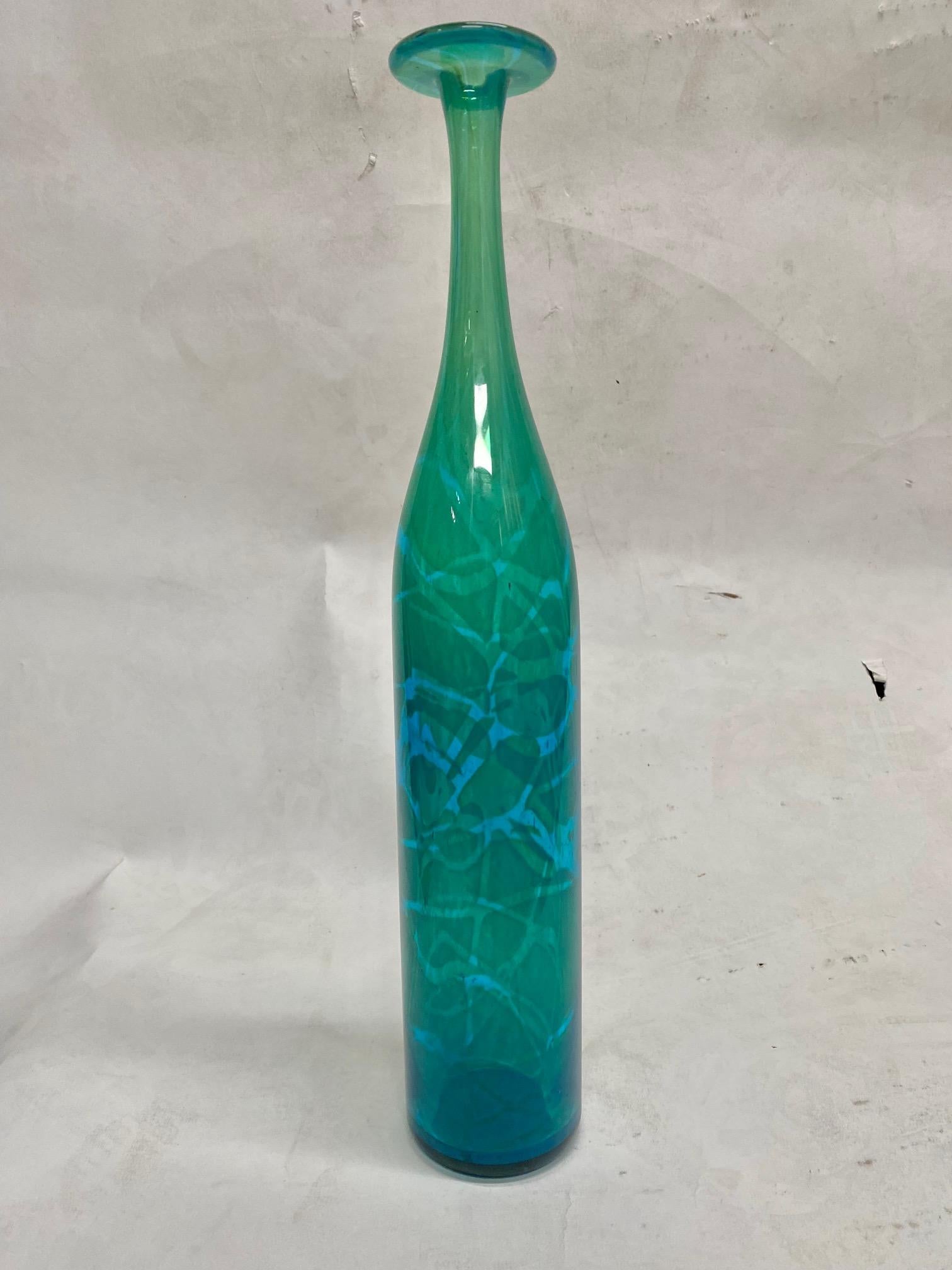 Blue and green Mdina tall glass bottle form vase by Michael Harris Signed: “Mdina”.