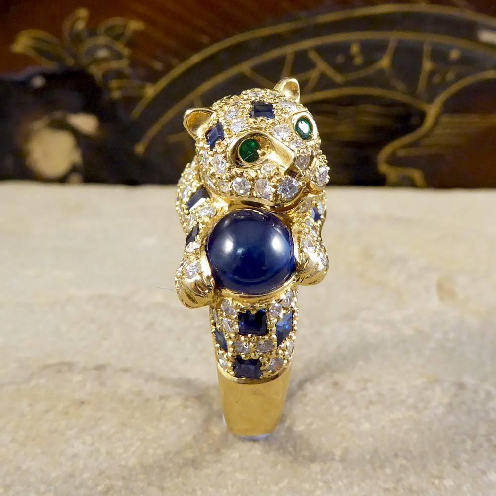 Exceptional Diamond and Sapphire Feline ring designed to resemble a similar Cartier Ring. As a member of the feline family this panther or leopard is set with Princess Cut Sapphires weighing 3.15ct in total with 1.45ct of Diamonds to adorn the ring