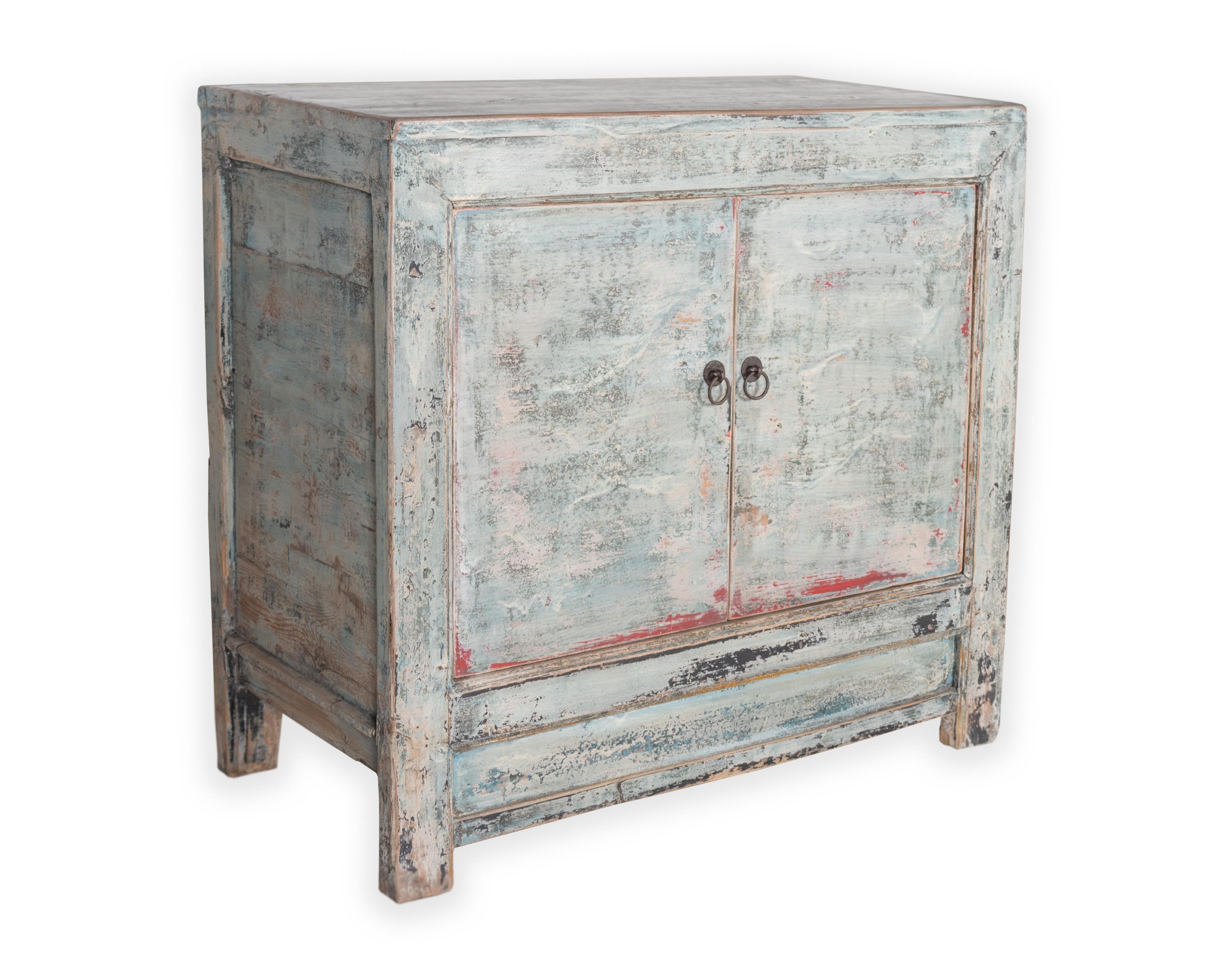 Blue and grey two door cabinet. 

Piece from our one of a kind line, Le Monde. Exclusive to Brendan Bass.