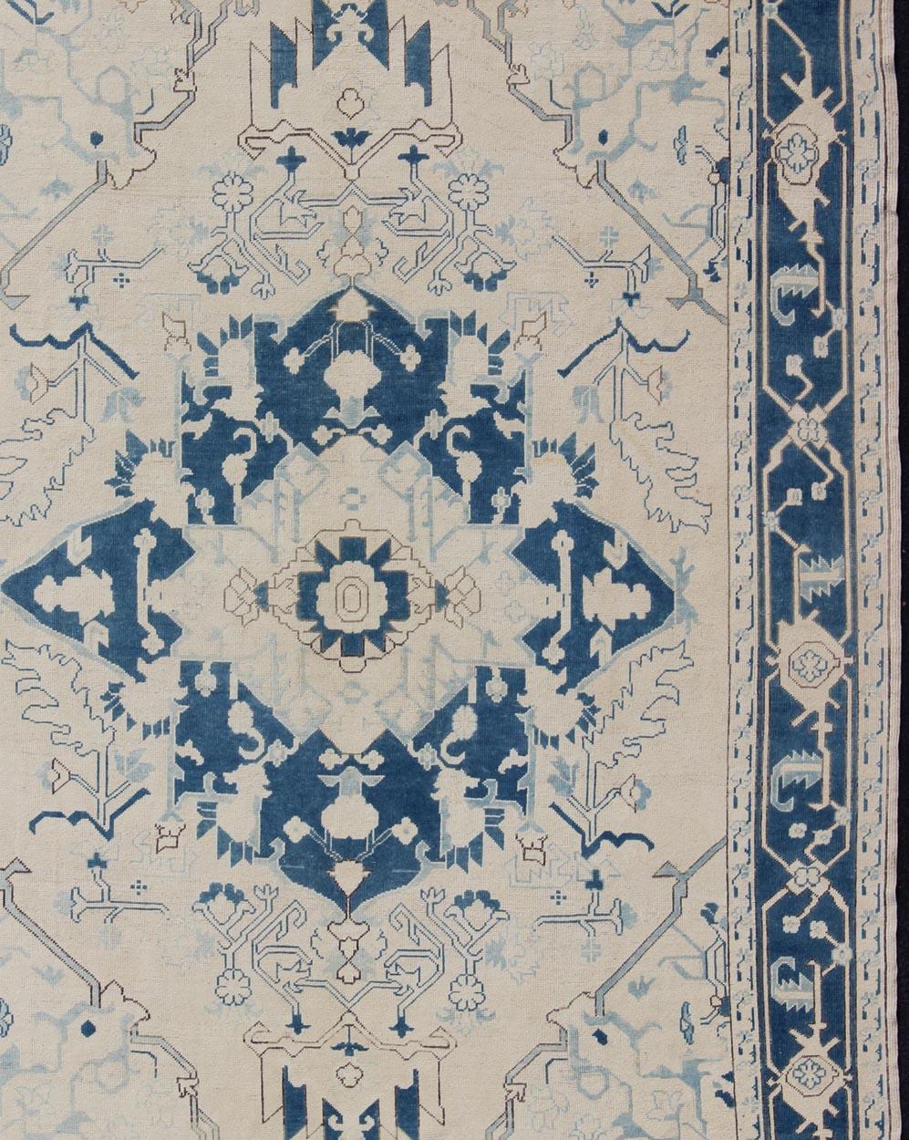 Hand-Knotted Blue and Ivory Geometric Design Vintage Turkish Rug with Blossoming Medallion For Sale