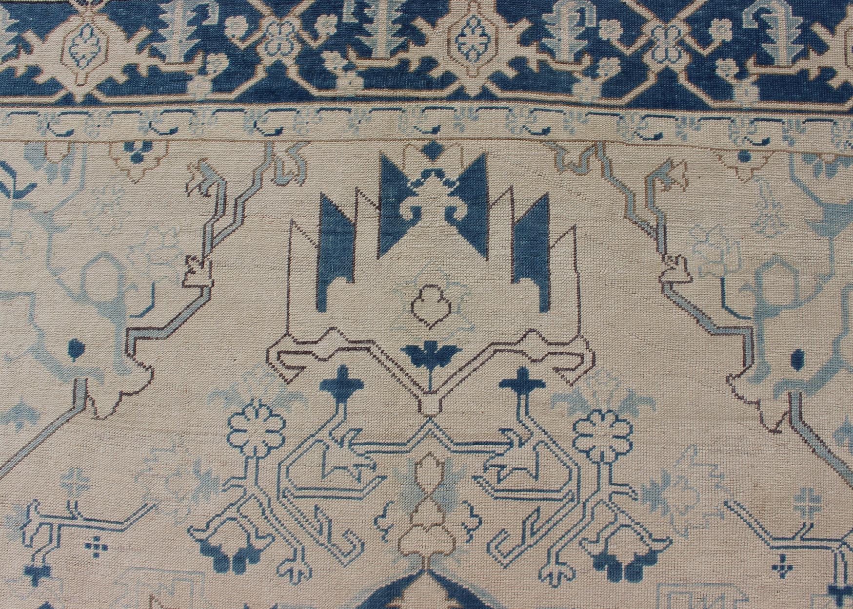 Blue and Ivory Geometric Design Vintage Turkish Rug with Blossoming Medallion For Sale 1
