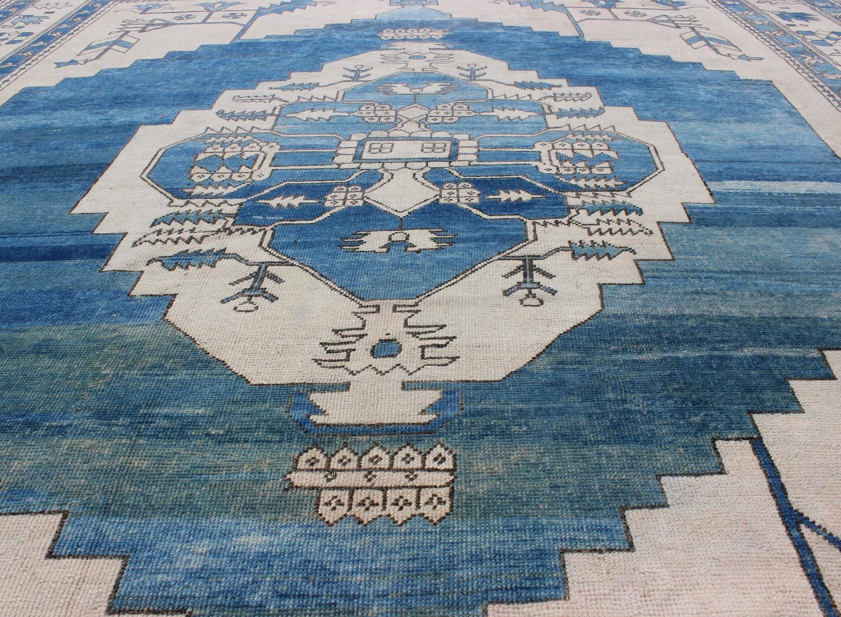 Blue and Ivory Medallion Vintage Turkish Oushak Rug with Tribal Geometric Design In Excellent Condition For Sale In Atlanta, GA