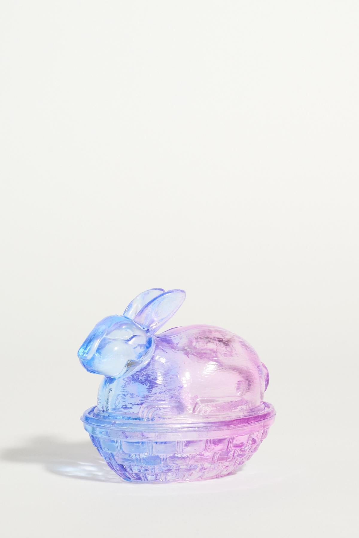 Purple and blue glass bunny lid with basket shaped bowl.