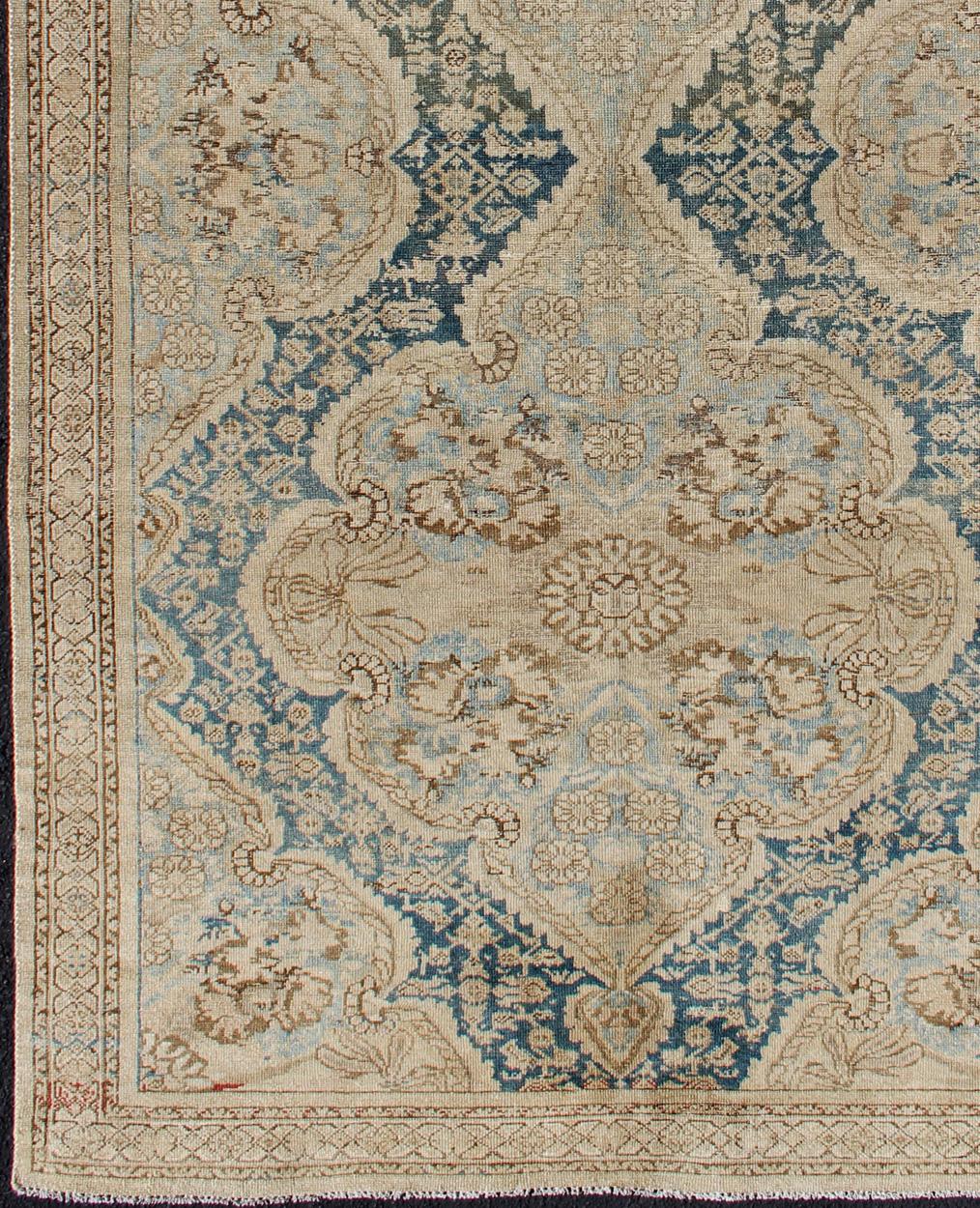     Malayer Antique short Gallery Rug from Persia with Botanical Medallion Design in nude and blue colors, rug 19-0102, country of origin / type: Iran / Serab, circa 1900.

This handwoven, antique Persian Serab rug features a central field imbued
