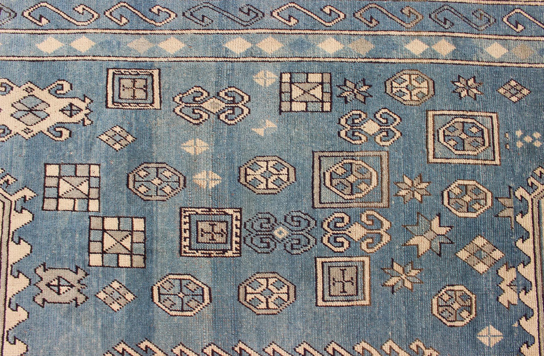 Wool Blue and Cream Vintage Turkish Oushak Rug with Hooked Medallion Design For Sale