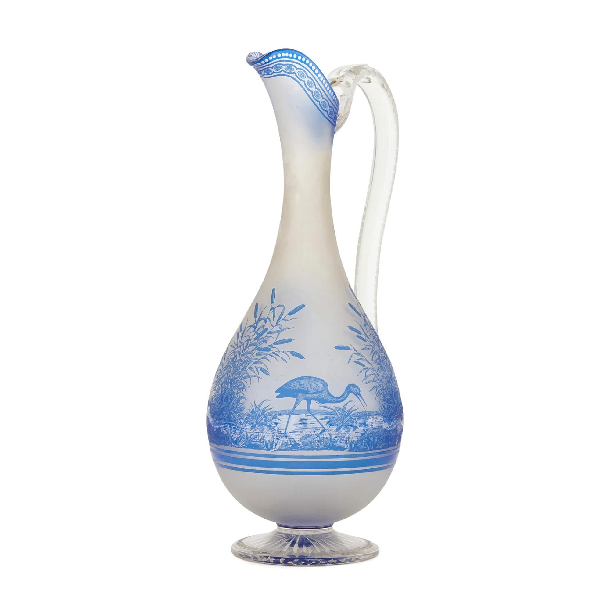 Blue and opaque etched glass ewer by Baccarat
French, 19th Century
Measures: Height 32cm, width 13cm, depth 12cm

This beautiful Baccarat glass ewer features a bulbous body with a long, slender neck terminating in a shaped mouth. The frosted