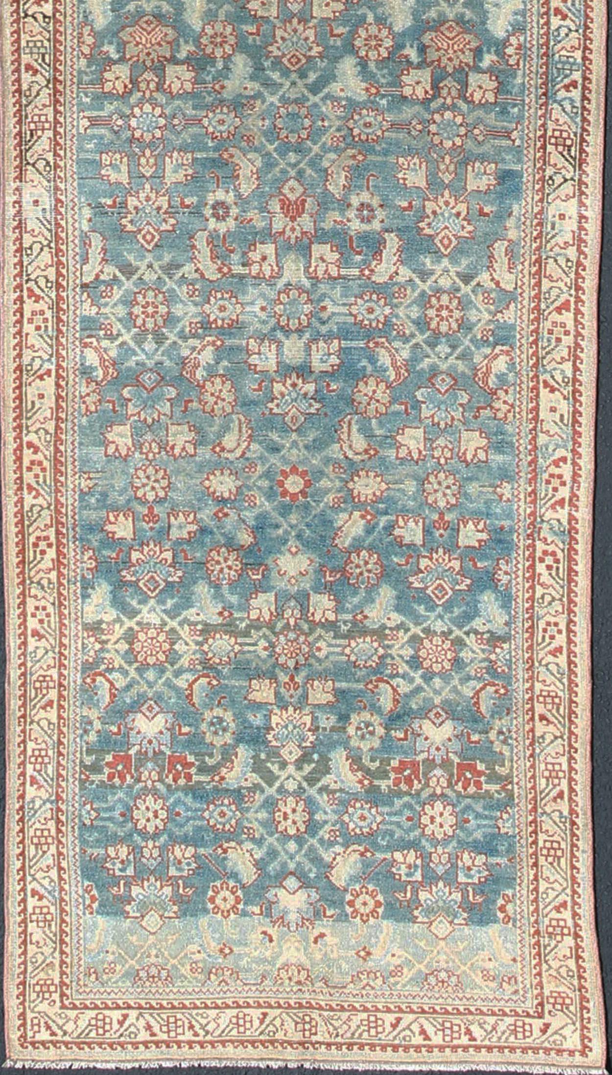 Floral design Persian antique Malayer runner in blue, red, nude tones, rug sus-1807-265, country of origin / type: Iran / Malayer, circa 1920

This antique Persian Malayer runner, circa early 20th century, relies heavily on exquisite details as well