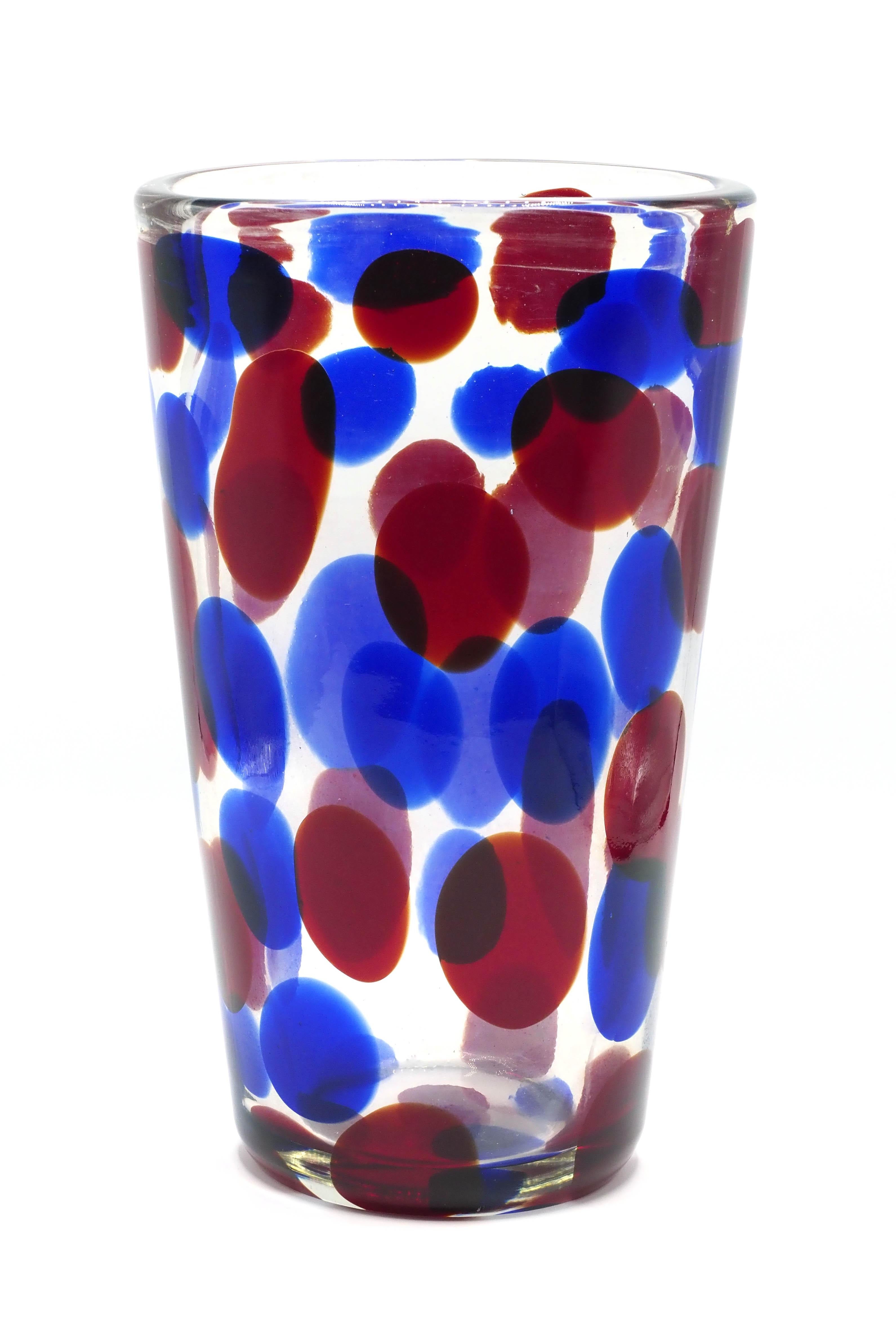 Blue-and-red-spotted Murano crystal vase by Aureliano Toso – 1950s
This cylindrical vase was designed and created by glass-blower Aureliano Toso (1884 – 1979) in Murano - Venice during the 1950s.
Made of transparent crystal (lead glass), it
