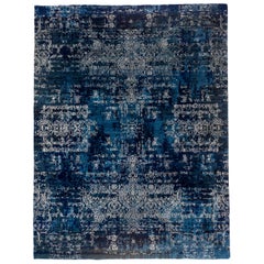 Blauer und silberner Hochflor-Teppich
