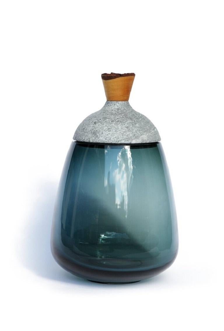 Blue and soapstone stacking vessel, Pia Wüstenberg
Dimensions: D 23 x H 37
Materials: glass, wood, soapstone
Available in other colors and in marble version.

Dense in its tones and materials, and in the same time refined in its composition,
