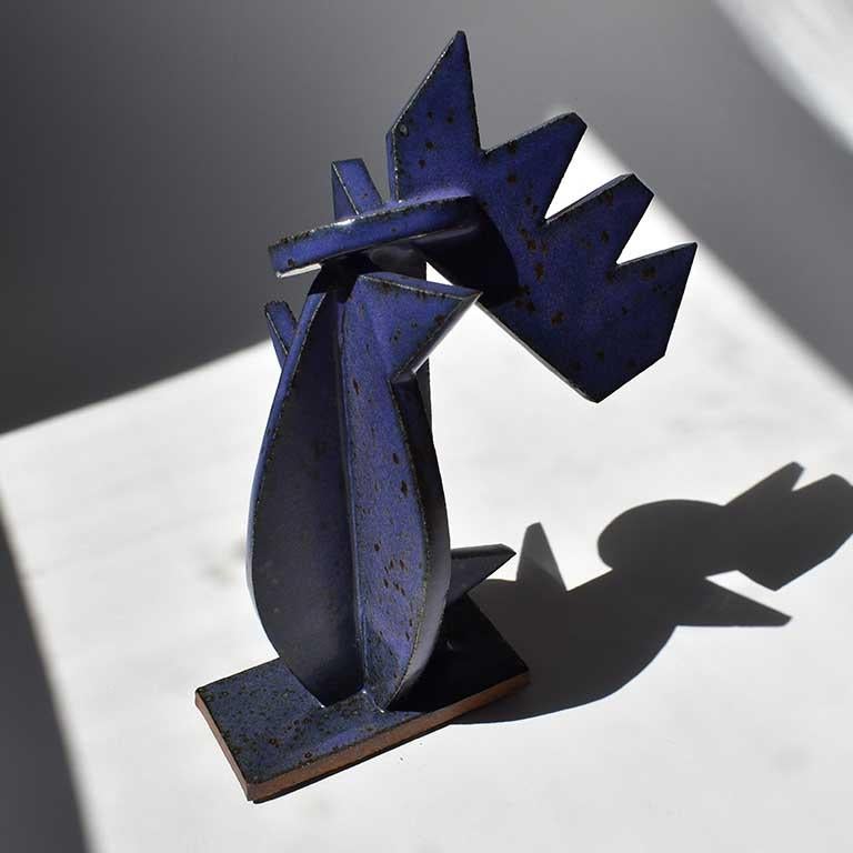 Contemporary abstract ceramic stoneware sculpture. In a vibrant violet/lavender glaze, made in 2019 by artist Emily Ladow Reynolds. Signed ELR on bottom

This piece would be a beautiful addition to any bookshelf, coffee table, nightstand or
