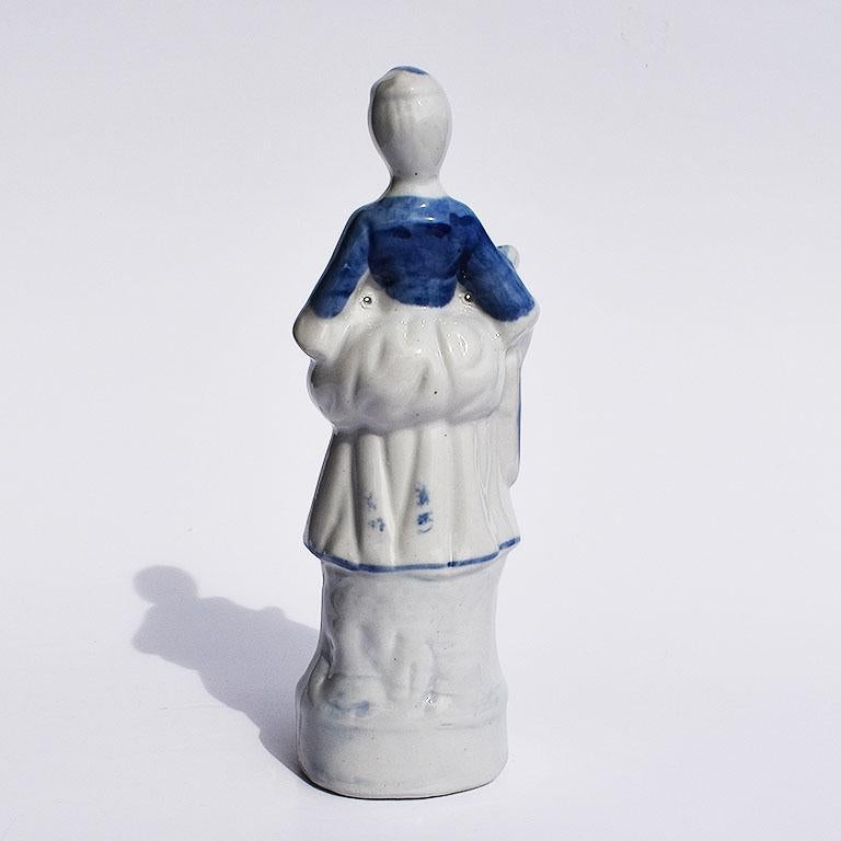 Georgian Blue and White Ceramic Chintz Figurine of a Peasant Woman For Sale