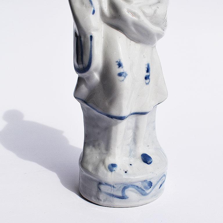 American Blue and White Ceramic Chintz Figurine of a Peasant Woman For Sale