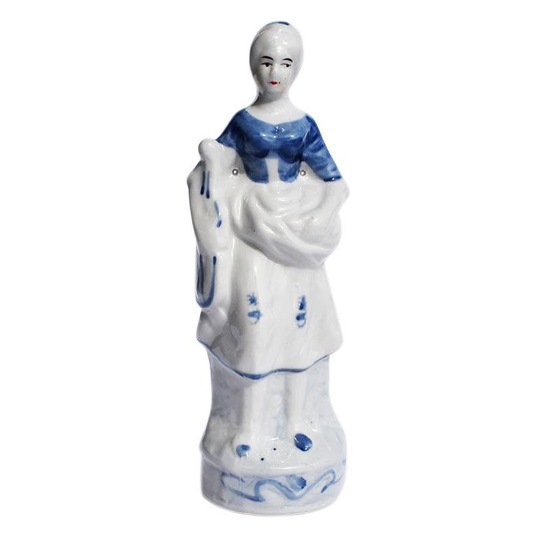 Blue and white ceramic bird figurine midcentury style pottery