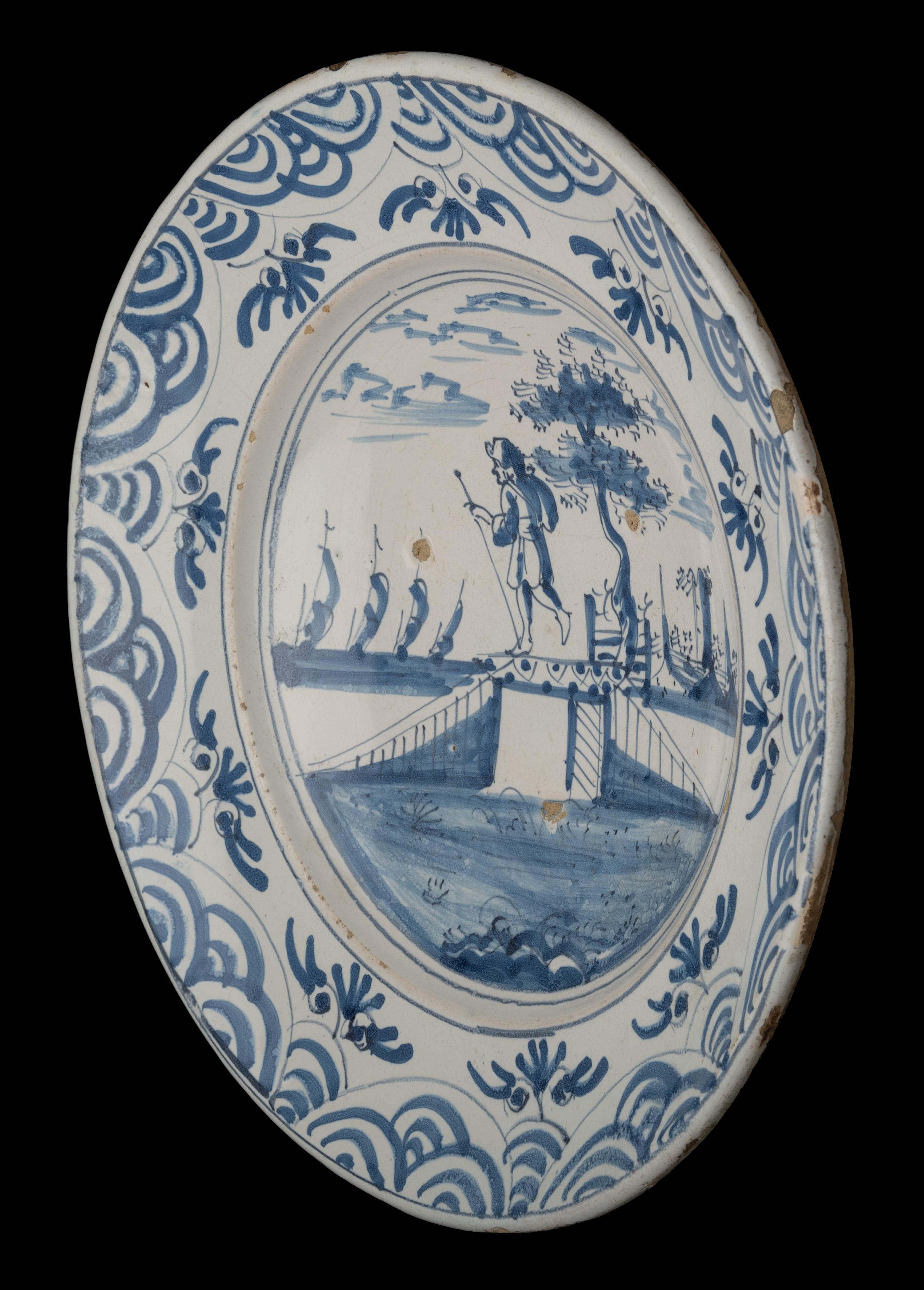 Glazed Blue and White Charger with a Shepherd in a Landscape Delft, 1670-1700 For Sale