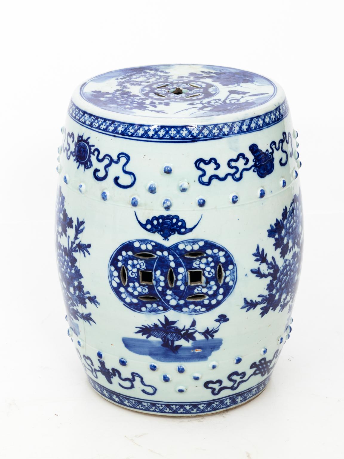 Blue and White Chinese porcelain garden seat with a butterfly motif. Please note of wear consistent with age to the glazed finish, circa 20th century.