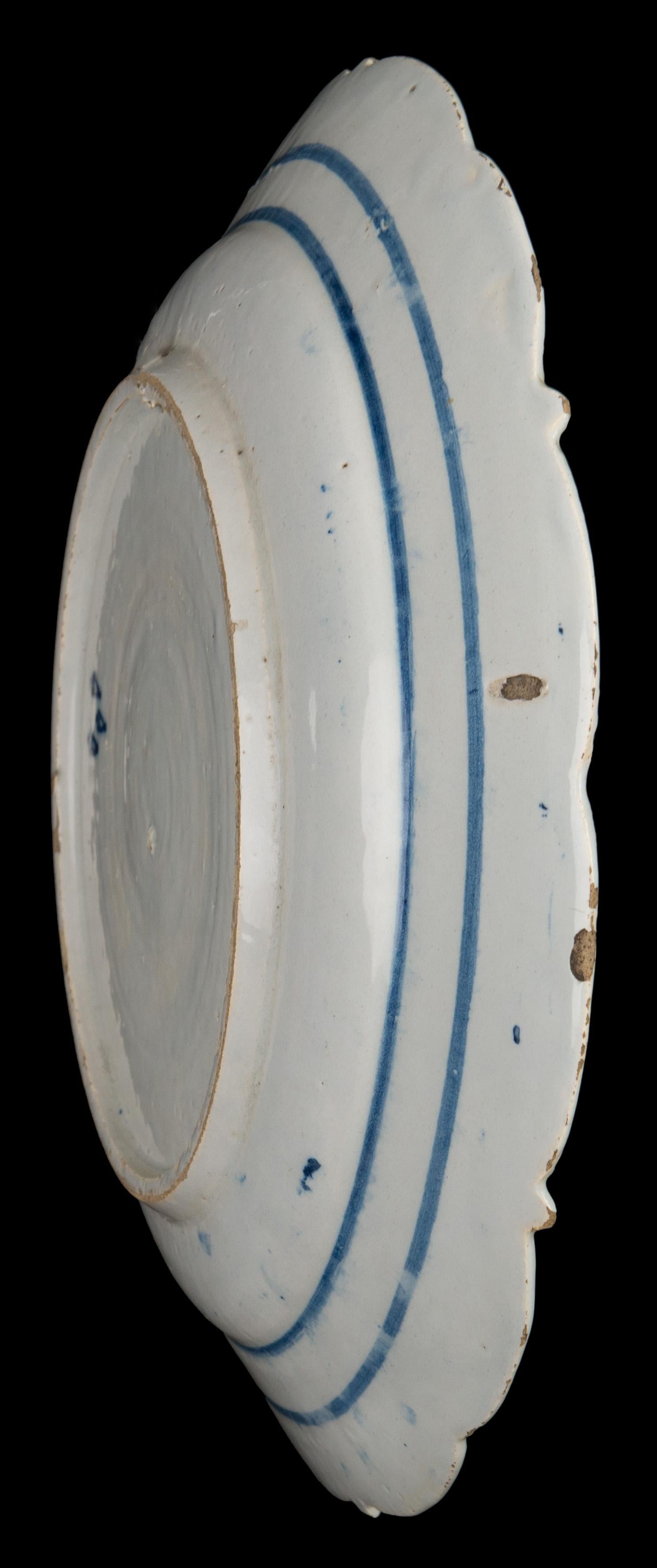 Glazed Blue and white chinoiserie dish with flower vase Delft 1740-1770 The Three Bells For Sale