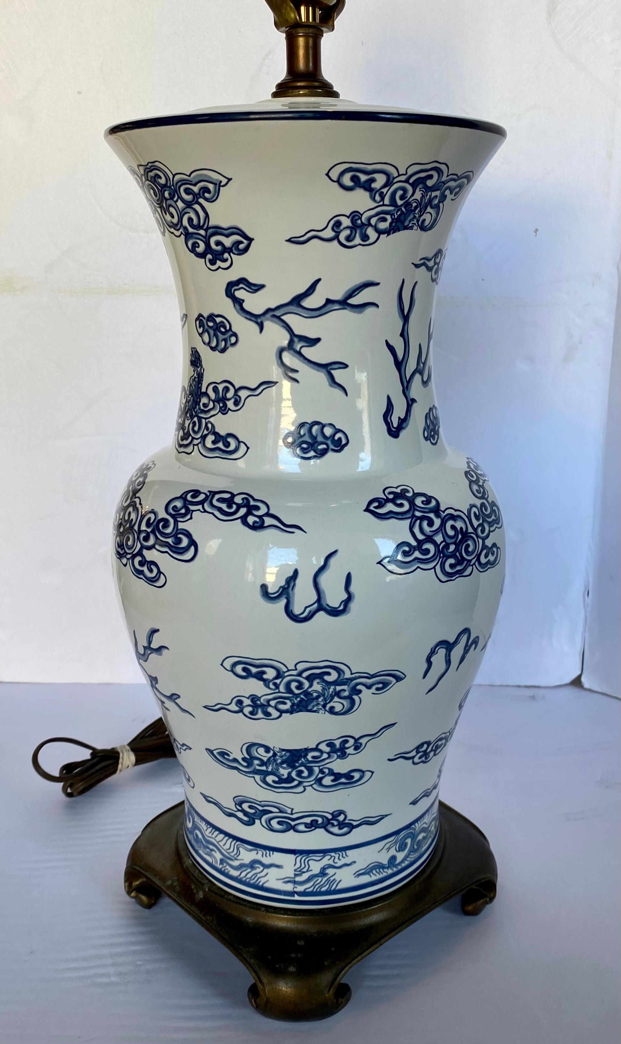 20th Century Blue and White Lucky Foo Dog and Coral Chinoiserie Porcelain Table Lamp For Sale