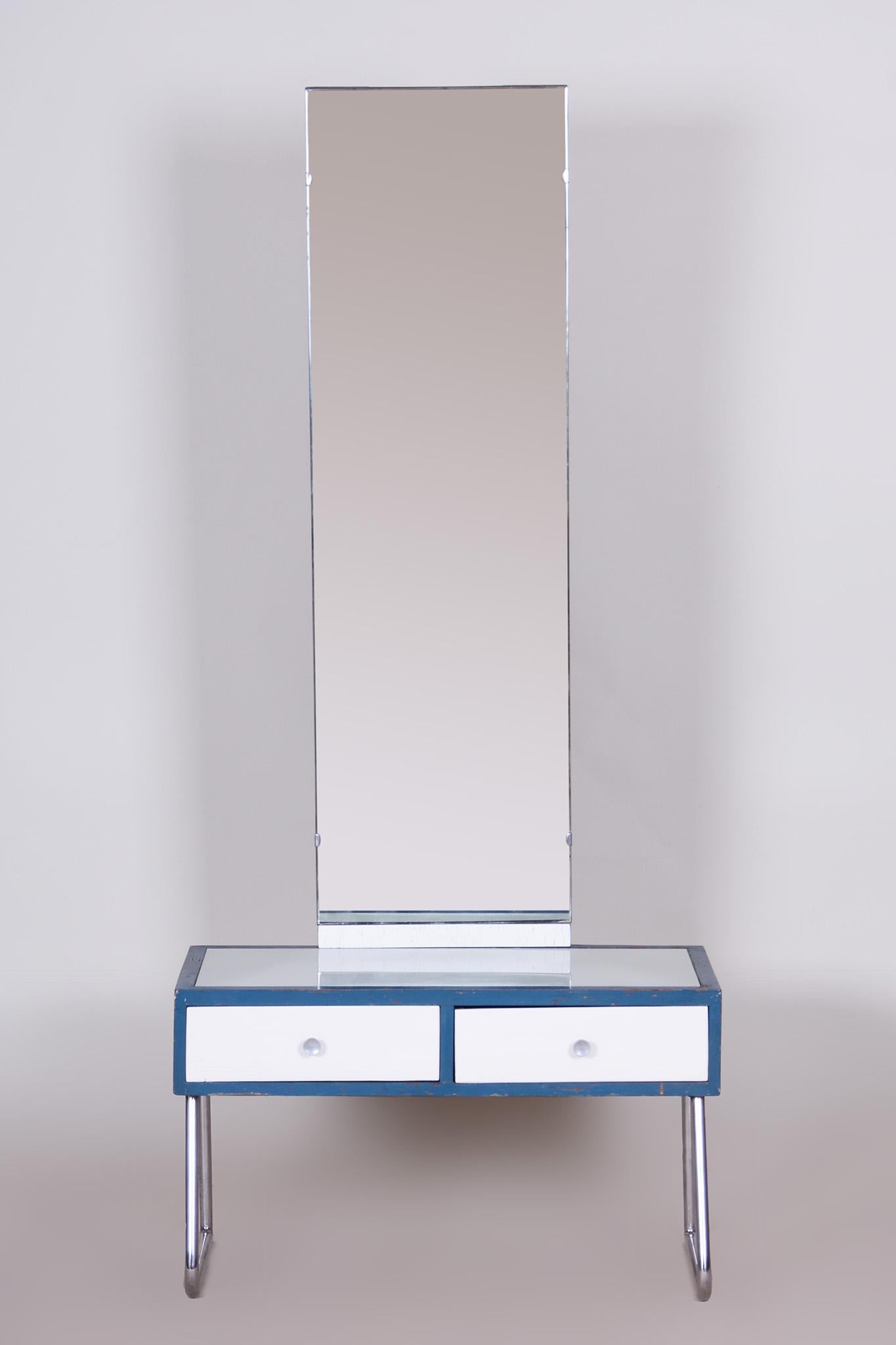 Blue and white chrome Bauhaus dressing mirror made in Czechia in the 1930s.
The mirror is completely original and has not been restored, it's in pristine original condition.
Chrome construction has been professionally cleaned.