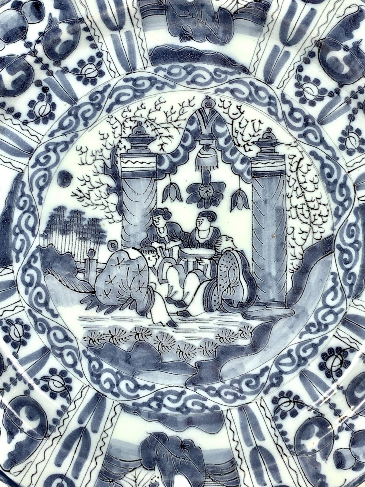 Made in the Netherlands in the late 17th century circa 1690, this extraordinary Delft charger is hand-painted in shades of cobalt blue.
The fascinating decoration is styled after Chinese Kraak porcelains made for export to Europe beginning in the