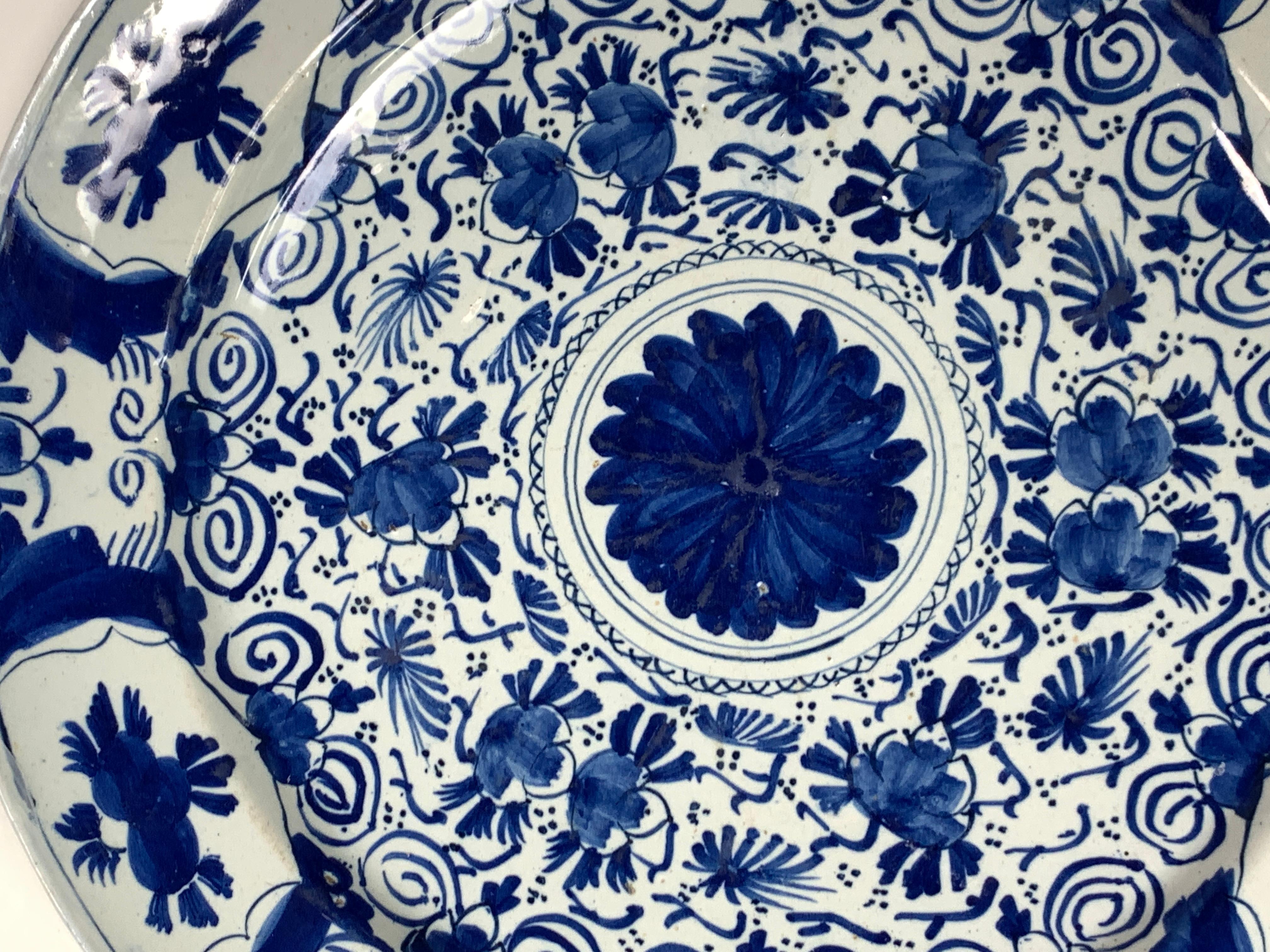 Rococo Blue and White Delft Charger Hand-Painted in Netherlands 18th Century Circa 1780